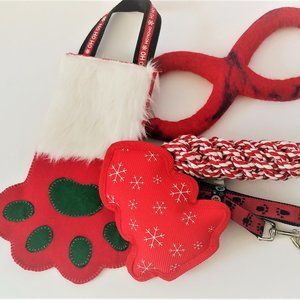 Dog Holiday Stocking Stuffed with Goodies Red Paw Shaped Holiday Dog Gifts